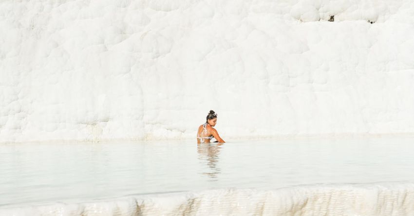 Limestone Terraces - Woman Bathing in Pamukkale Travertine Terraces Pools